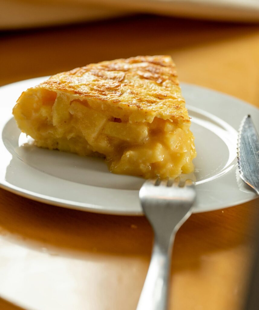 Traditional Spanish potato omelet (Tortilla de Patatas) served in a Barcelona café.