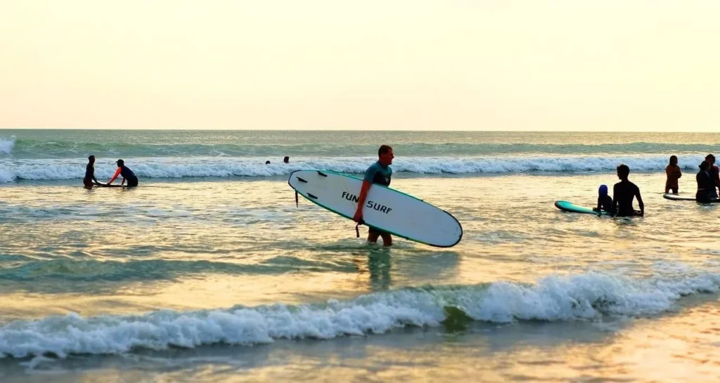 Surfing is must-visit bali attractions